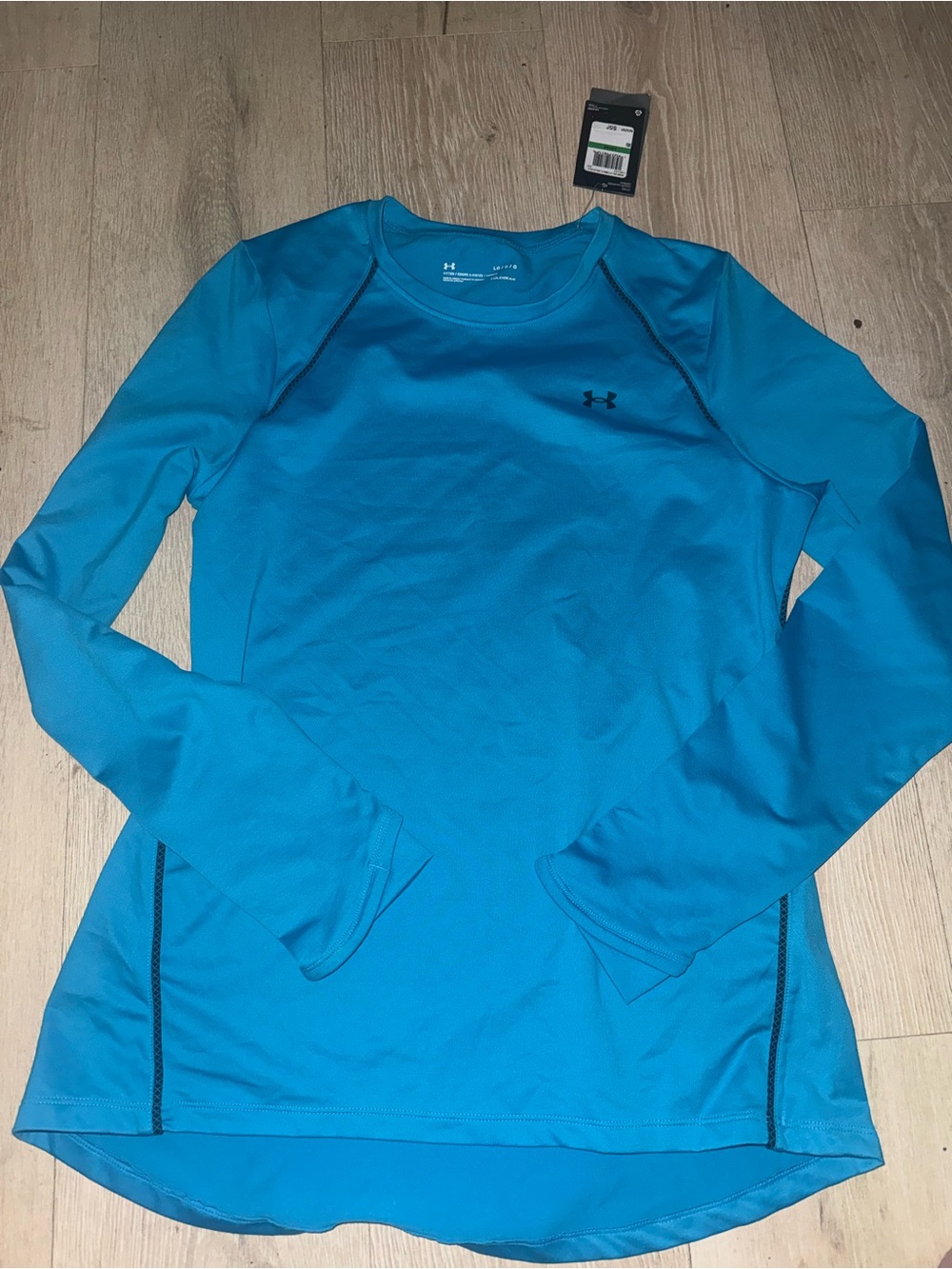 Under Armour Women's Teal Long-Sleeve Performance Tee